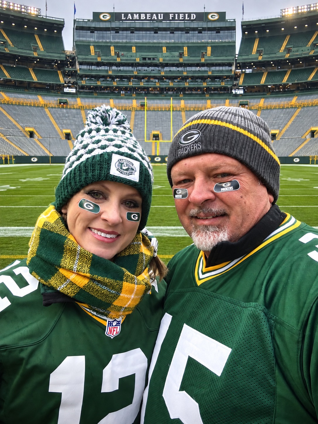 Bonnie and Thomas Shanteau smiling together at Lambeau Field